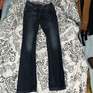 guess jeans, low rise boot cut with bedazzled back pocket.